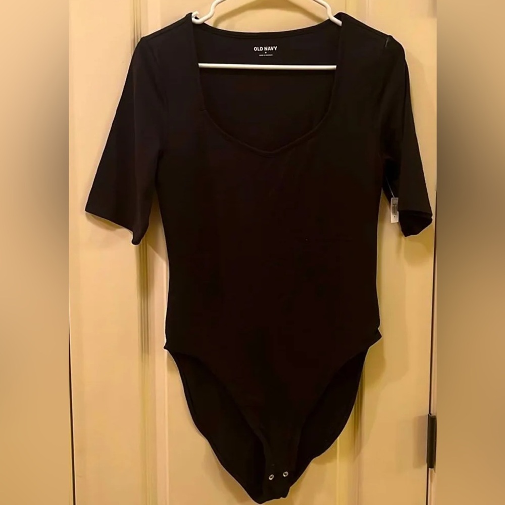 Old Navy Black bodysuit with 3/4 sleeves, no tags, worn only in fitting room.